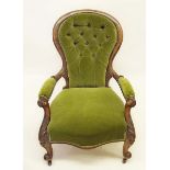 A Victorian button upholstered spoon back chair on scroll supports