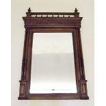 A Victorian spindle topped mirror flanked by twin pillastas 80 x 120cm