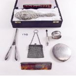 A boxed silver brush, napkin ring, comb etc.