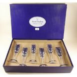A set of six Royal Doulton cut glass champagne flutes