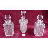 Two cut glass spirit decanters and one other