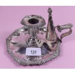 A Victorian silver plated chamberstick with snuffer engraved with an Admiral's crest