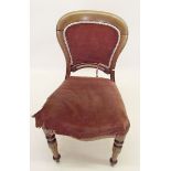 A Victorian hoop back dining chair upholstered in pink
