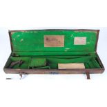 Canvas and leather gun case (a/f) with fitted interior for 28 ins barrels, and William Powell &