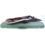 Woodstream hard plastic gun case with eggshell foam lining; fleece lined and padded gunslips; padded