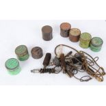 Eight japanned percussion cap tins and various pull thru's, mops, etc.