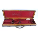 Oak and leather gun case with brass corners, fitted interior for 30 ins barrels