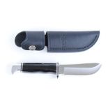 Sheath knife with 4 ins single edged blade stamped Buck 103 USA, steel mounts, black grips,