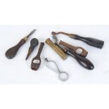 Wad punches; two nipple keys; two turnscrews; cartridge extractor and brass lighter