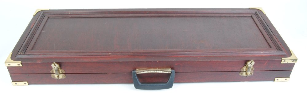 Hardwood gun case with brass corners fitted for 30 ins barrels, including two padlocks, 35 x 13 x