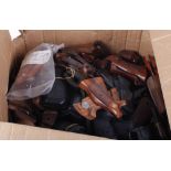 Two boxes containing a large quantity of pistol grips