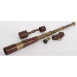 Military three drawer leather covered brass spotting scope, c.1914, with high and low viewing lenses