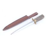 English dirk, brass recurve quillons, stag horn handle, with 6,1/2 ins double edged blade,  white