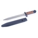 Contemporary bayonet with double edged 8 ins blade, wood grips, steel sheath, in unissued condition