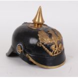 Brass mounted leather covered German picklehaube