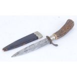 Victorian hunting knife with 5,1/2 ins bowie style blade, stag horn handle, white metal pommel,