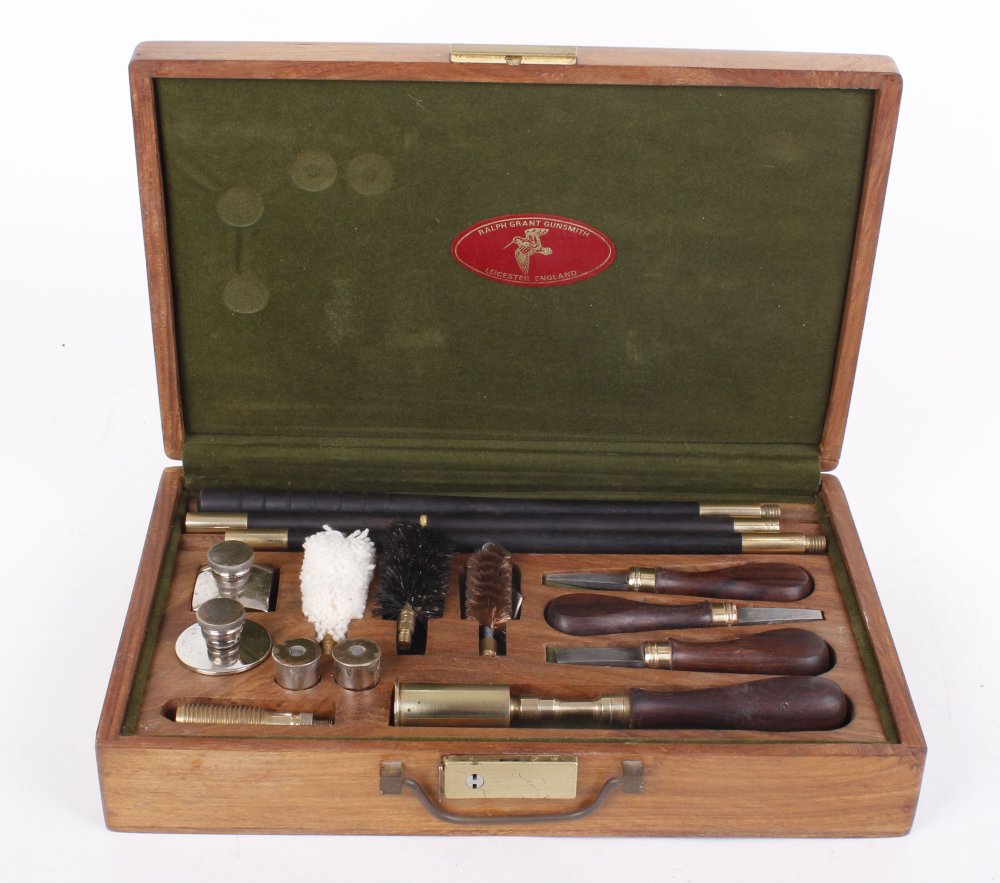 Ralph Grant wooden boxed 12 bore cleaning kit comprising rods, oil bottles, brushes, mops, snap