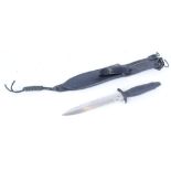Gerber Mk I. survival knife with 7 ins double edged blade, serrated tip, in sheath marked Gerber