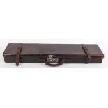 Leather gun case with red baize lined interior for 31 ins barrels
