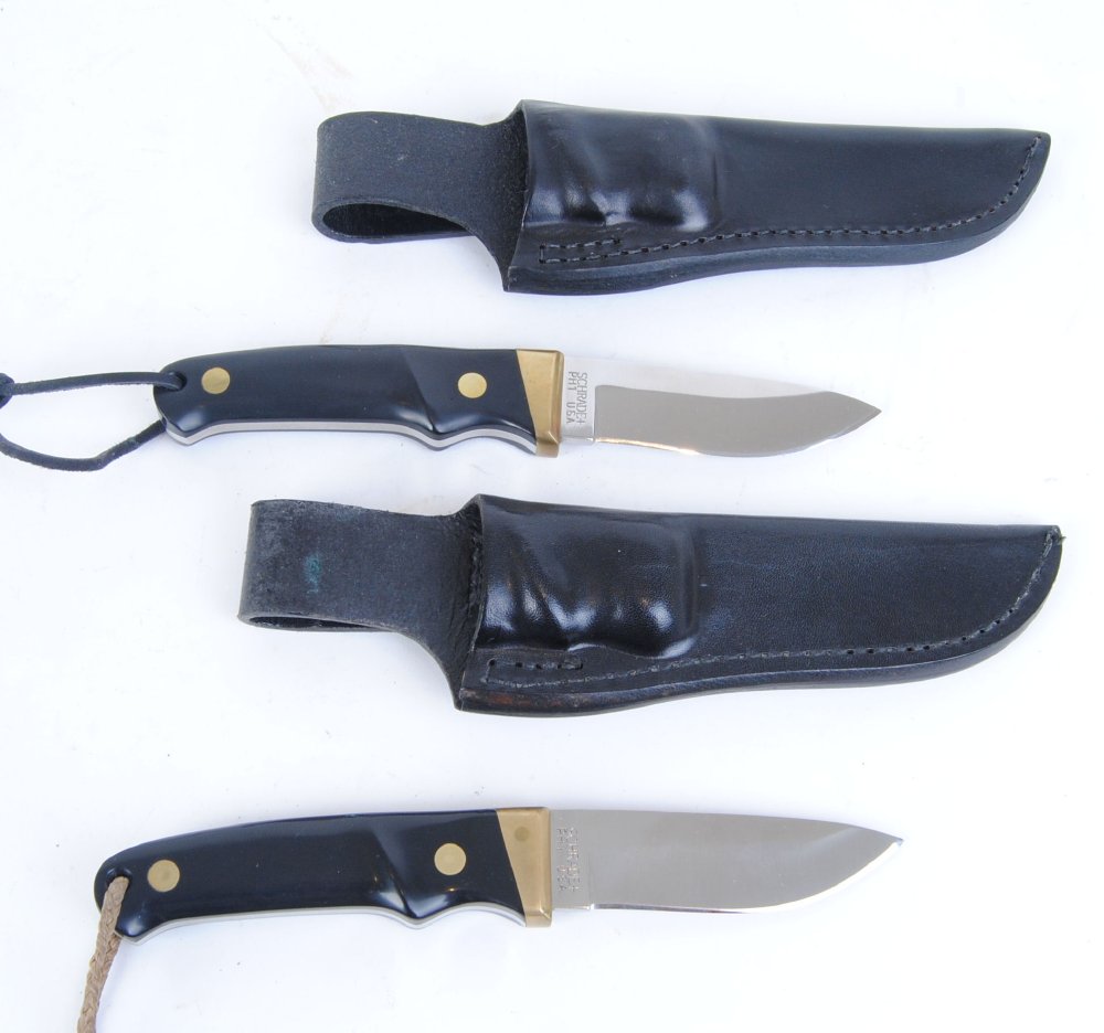 Two Schrade PH 1, knives with 3,1/2 ins single edge blades, brass mounts and studs, composite - Image 2 of 2