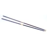 Two Rosewood two piece cleaning rods with brass mounts, 35 and 33,1/2 ins overall