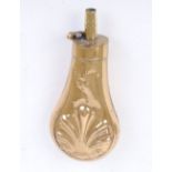 Brass pistol flask with embossed shell decoration, 4,1/2 ins high