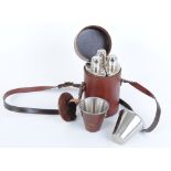 Leather pouch with three flasks and four stainless steel tot cups in leather pouch