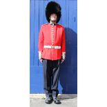 Grenadier Guards full uniform tunic, trousers, boots, white leather belt, bearskin and grey winter