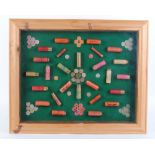 Glazed cartridge display board with mainly 12 bore cartridges by Pall Mall, Arthur Turner, Wizard,