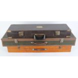 Leatherette motor case, brass mounted, fitted for 28 ins barrels, together with wooden gun case,