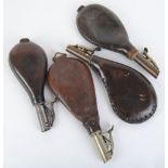 Four various  bag shaped leather shot flasks with brass or steel dispensers, by G & J W Hawksley,