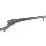 Indian matchlock with 44 ins full stocked six band barrel, cleaning rod, brass mounted (trigger a/