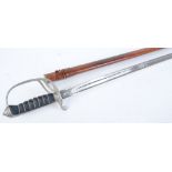 Dress sword with 34 ins slightly curved single edged fullered blade, the etched blade with the