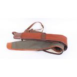 Two canvas and leather fleece lined gun slips