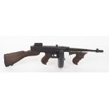 .45 (acp) Thompson SMG, film replica in wood with drum magazine.  This Lot is offered for the