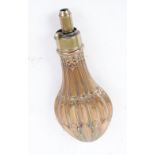 Copper and brass pear shaped powder flask with embossed fluted decoration by G & J W Hawksley, 8,1/2