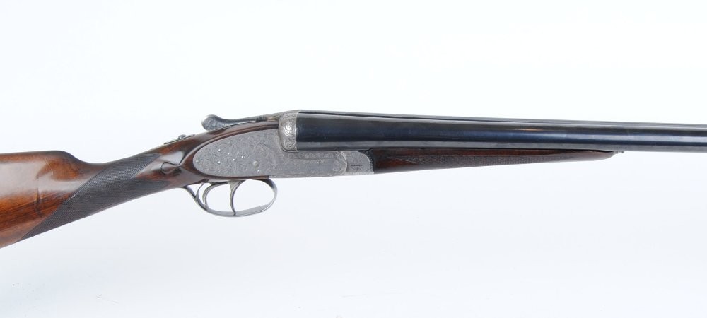 12 bore sidelock ejector by AYA No.2,  26 ins chopper lump barrels, 1/4 & 1/4,  70mm chambers,