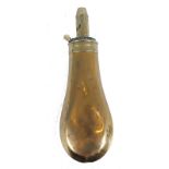 Brass bag shaped plain powder flask (dents), inscribed Sykes Patent, 7,1/2 ins high