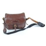 Leather cartridge bag with fold over lid