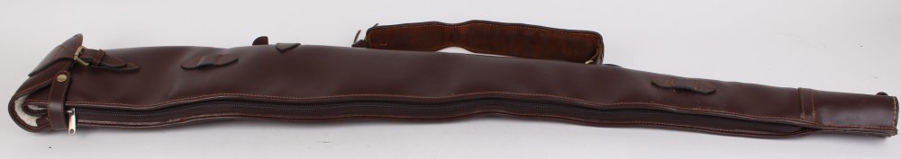 Fleece lined leather gun slip with leather sling and brass fittings, 51 ins