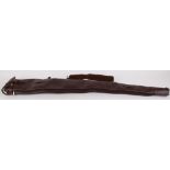 Fleece lined leather gun slip with leather sling and brass fittings, 51 ins