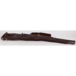 Fleece lined leather gun slip with leather sling and brass fittings, 51 ins