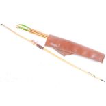 Lemonwood longbow with 48 lb draw weight, 71 ins with horn tips, leather bound grip together with