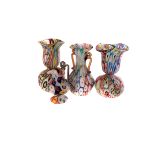 Four pieces of late 19th century Millefiori glass, in the form of graduated jugs, together with a