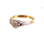 An 18ct gold diamond sweetheart ring, the round cut stone set in a heart shaped platinum mount,