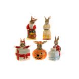 A collection of five Bunnykins porcelain figures, including Christmas Surprise DB146, Happy Birthday