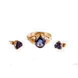 A suite of tanzanite jewellery, comprising a 9ct gold and pear cut tanzanite ring and a pair of