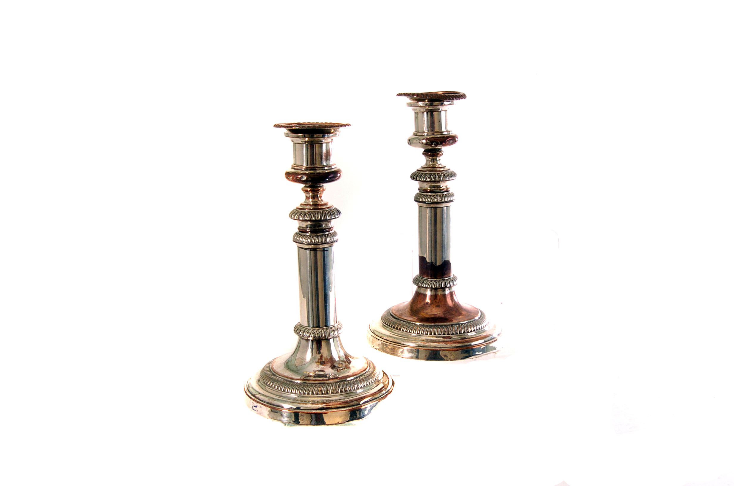 A pair of George III old Sheffield plate Matthew Boulton candlesticks, having telescoping