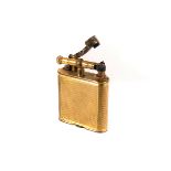 A vintage gilt metal Dunhill lighter, No 143752