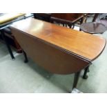 A large 19th century mahogany oval drop leaf table, on cabriole legs, to pad feet, approx 131cm W